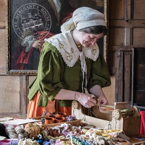 A historical interpreter bringing the house to life