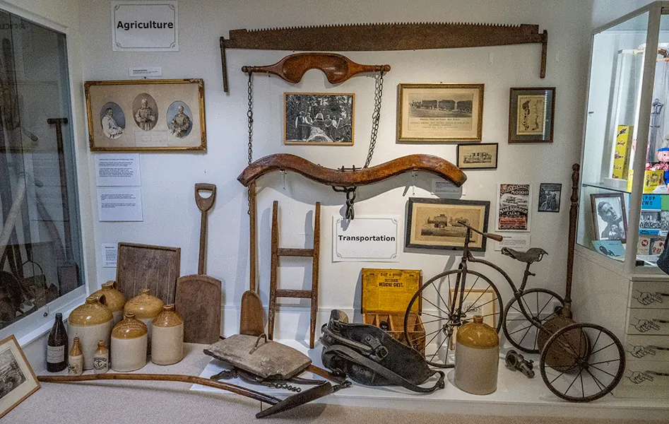A museum display of domestic, trade and local-history objects
