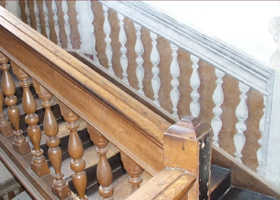 The carved oak staircase inside The Merchant’s House